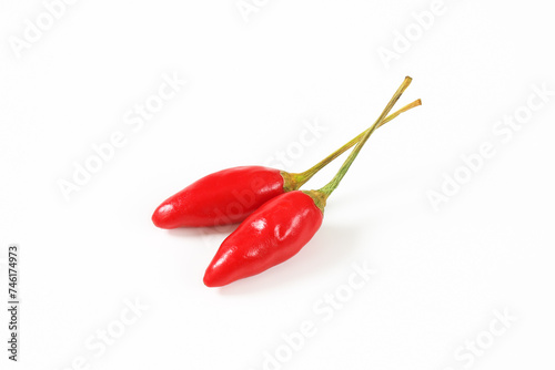 Two small red chili peppers