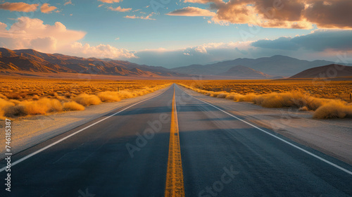 Mountainous Road Leading to the Sky under a Sunset Horizon, Highway Amidst Rural Nature, Summer Journey in Empty Fields with Clouds and Mountains in the Background