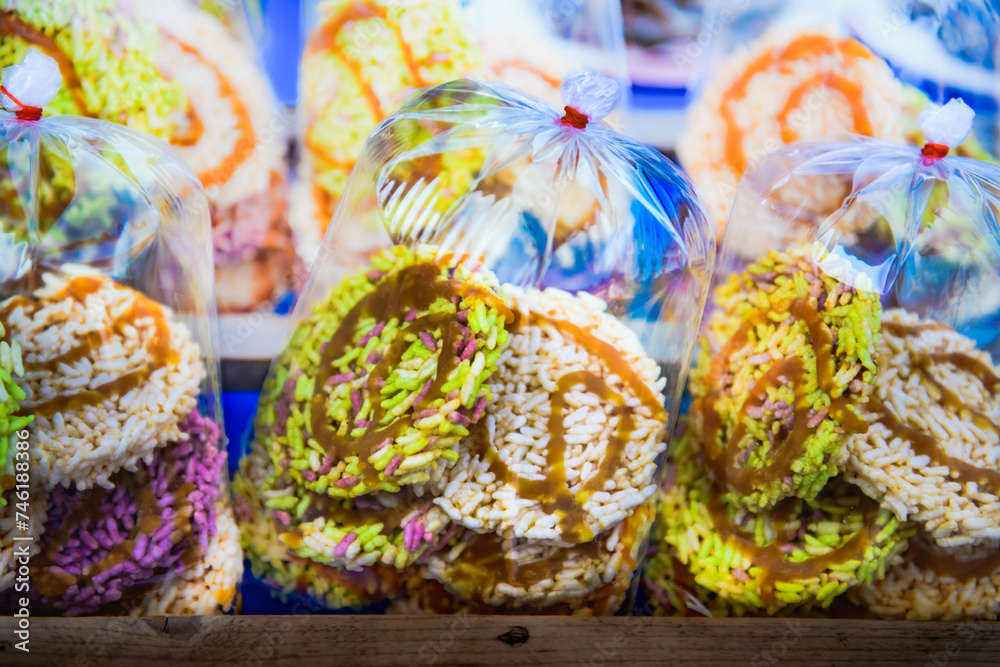 Thai crispy rice cracker in plastic bag on a food stall at Nakhon Sawan Province