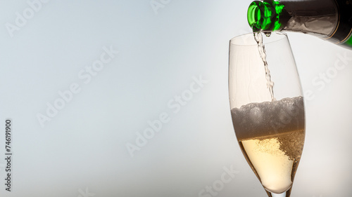 Canvas Print champagne is poured into a glass with free space for text