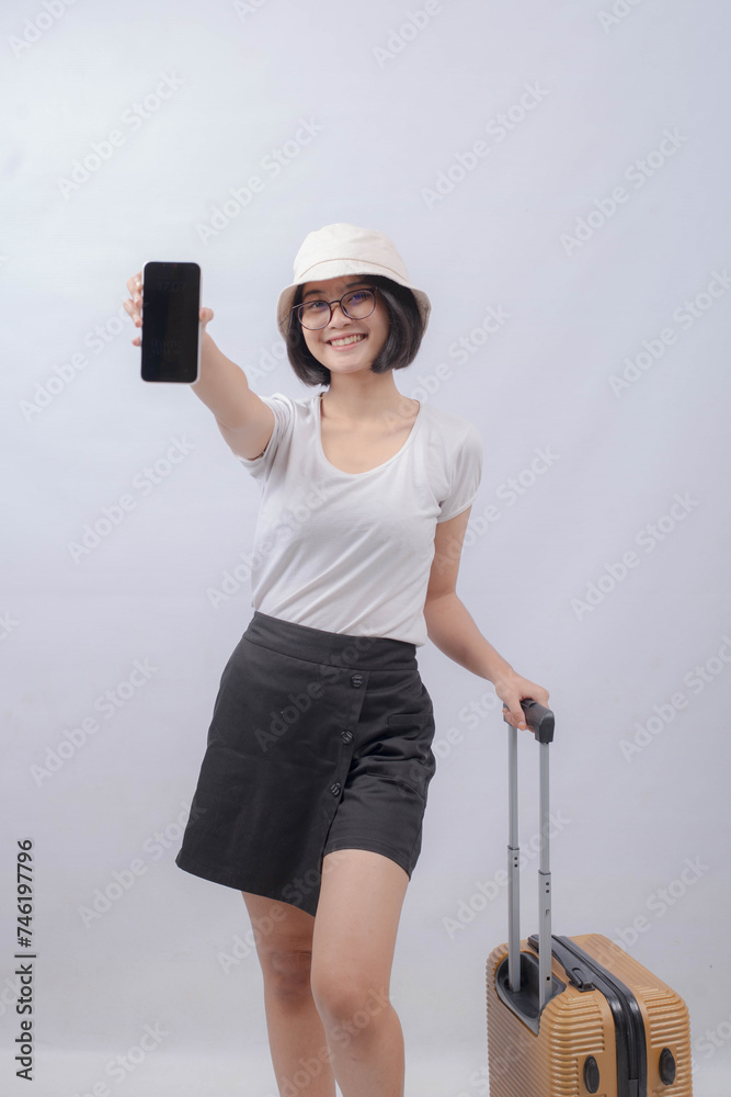 Young Asian Woman Ready Going on Vacation, Isolated on White Background Young Asian Woman Ready Going on Vacation, Isolated on White Background