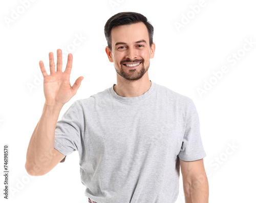 Handsome man showing five f...
