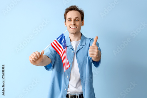 Young man with USA flag sho...