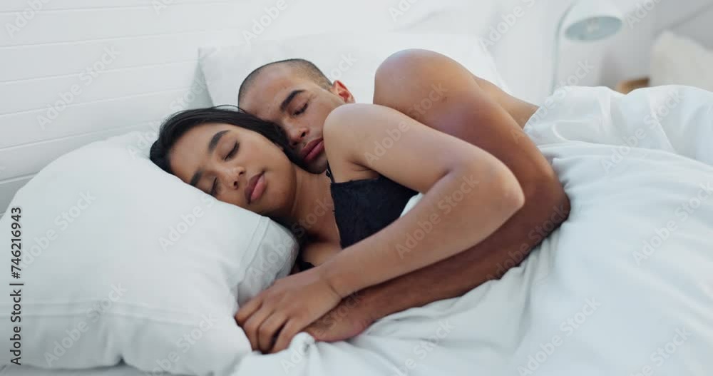 Couple, hugging and sleeping in bed together, love and resting or comfortable at home on weekend. People, bedroom and security in embrace, bonding and nap on sunday morning and relaxing or dreaming Couple, hugging and sleeping in bed together, love and resting or comfortable at home on weekend. People, bedroom and security in embrace, bonding and nap on sunday morning and relaxing or dreaming