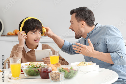 Teenage boy with headphones...