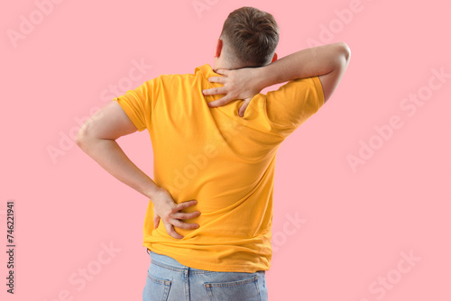 Man experiencing back and n...