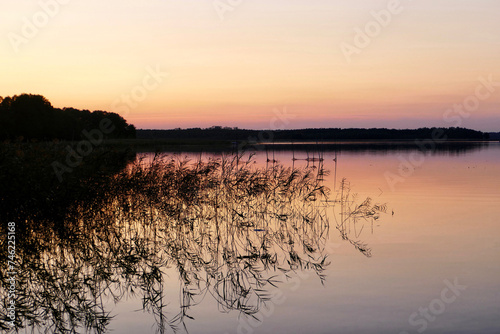 Sunset at lake in rural Masuria, Poland