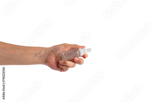 Hand and plastic white tube for cream or lotion. Skin care or sunscreen cosmetic on transparent background.
