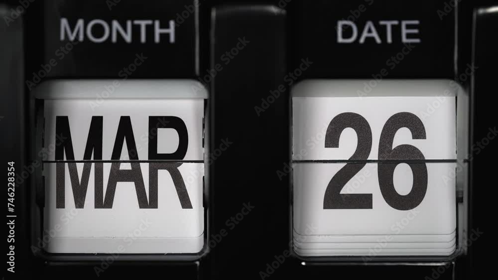 retro flip calendar with a date change from the twenty-fifth of March ...