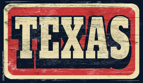 Aged and worn vintage Texas sign on wood
