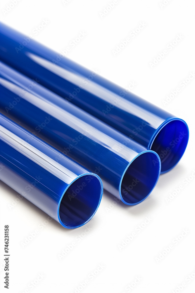 A set of cobalt blue PVC pipes on a white background, depicting industrial materials and plumbing concepts