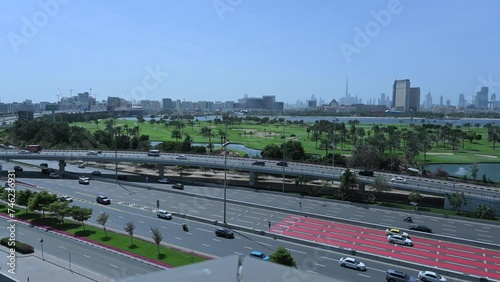 Dubai skyline from Deira with traffic on Airport Road, United Arab Emirates photo