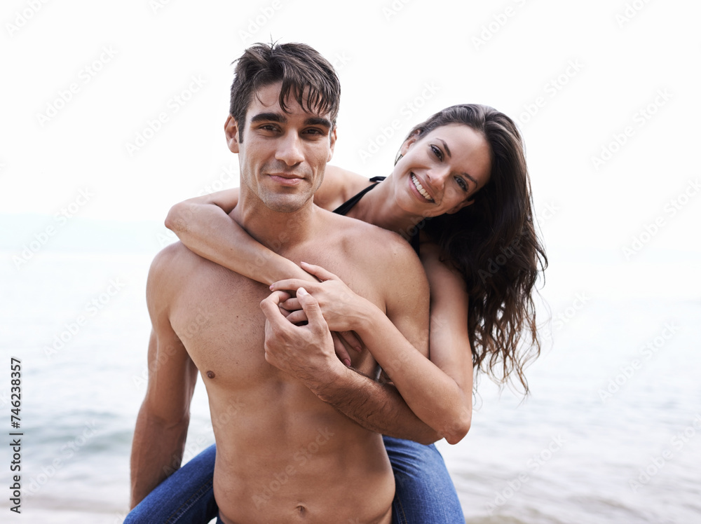 Portrait, love and happy couple in waves at beach for outdoor travel adventure, summer holiday and embrace. Piggy back, woman and man on vacation in nature on romantic date together with smile. Portrait, love and happy couple in waves at beach for outdoor travel adventure, summer holiday and embrace. Piggy back, woman and man on vacation in nature on romantic date together with smile.