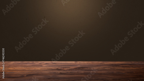 An empty wooden table with brown wall background