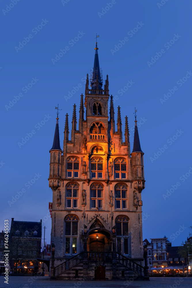A scenic view of Stadhuis van Gouda, is old City Hall of Gouda in the Netherlands during nighttime