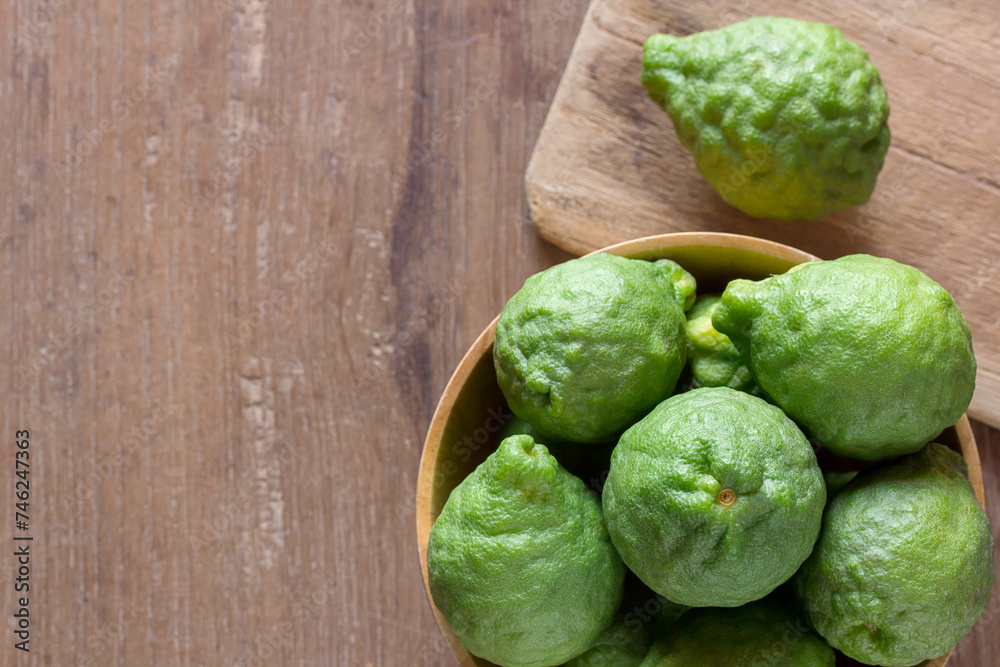 Fresh bergamot dark tone background. Fresh bergamot dark tone background.