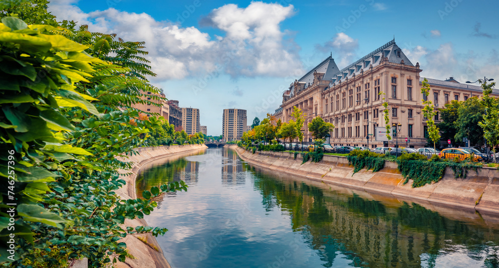 Obraz na płótnie Wonderful morning cityscape of Bucharest city - capital of Romania, Europe. Spectacular summer view of Court of Appeal Building on tne Dambovita river. Traveling concept background. w salonie