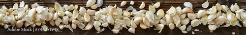 Chopped garlic macro sharp focus on texture against wooden backdrop