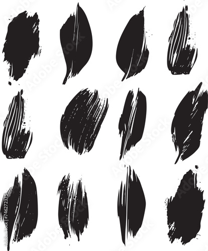 Set of vector hand drawn grunge style black feather signs and strokes