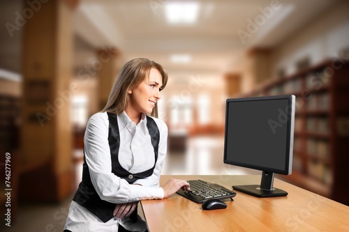 Happy young woman working with call headset