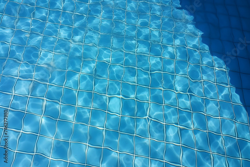 Water pool with sun reflection and floor tiling