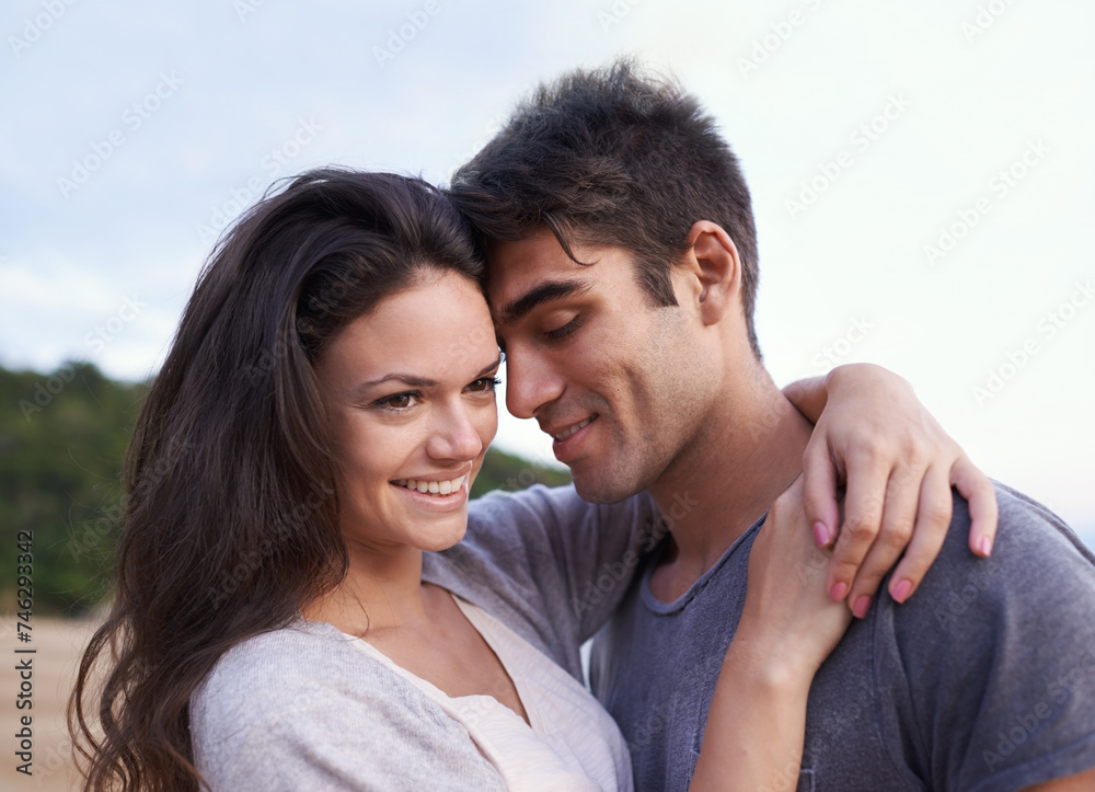 Couple, hug and outdoor with love on holiday or travel together on vacation in summer. Romantic, date and man with gratitude for woman and smile with kindness, care and support for partner in embrace Couple, hug and outdoor with love on holiday or travel together on vacation in summer. Romantic, date and man with gratitude for woman and smile with kindness, care and support for partner in embrace