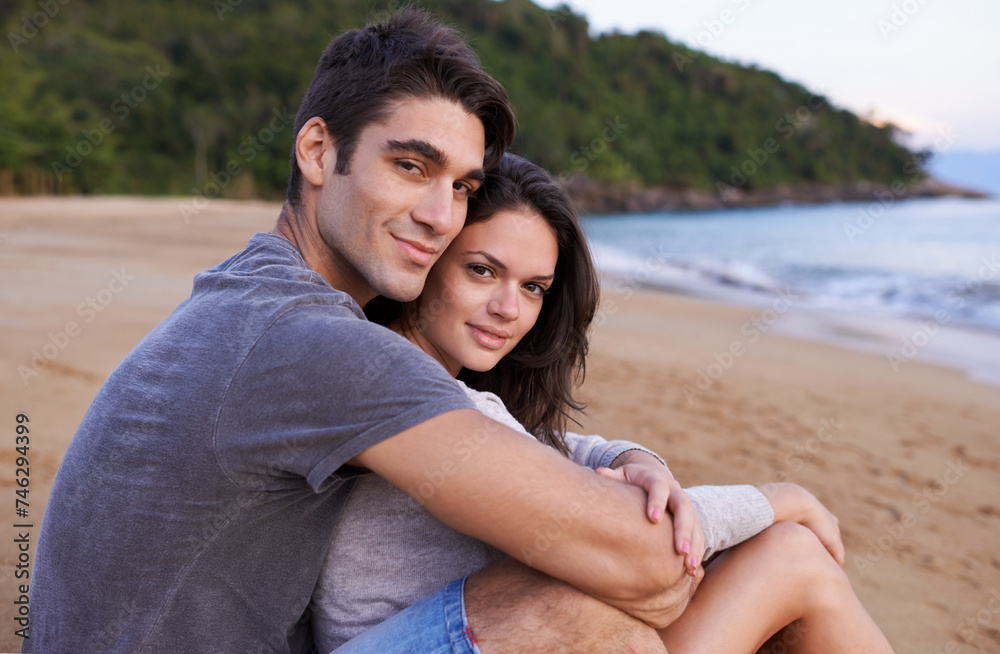 Obraz premium Portrait, hug and happy couple on beach for outdoor travel adventure, summer island holiday and relax. Ocean vacation, woman and man embrace in nature on romantic date together with smile in Bali.