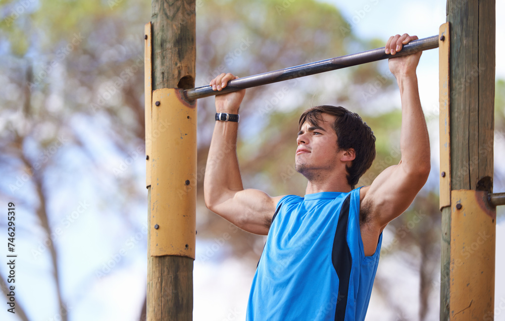 Park, fitness and man on pull up bar with exercise for morning training, health and muscle building in San Francisco. Trees, nature and person with workout for energy, performance and healthy body