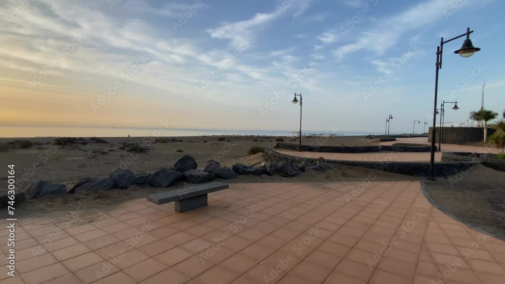 Sunrise on the coastal promenade in the city of Puerto del Carmen