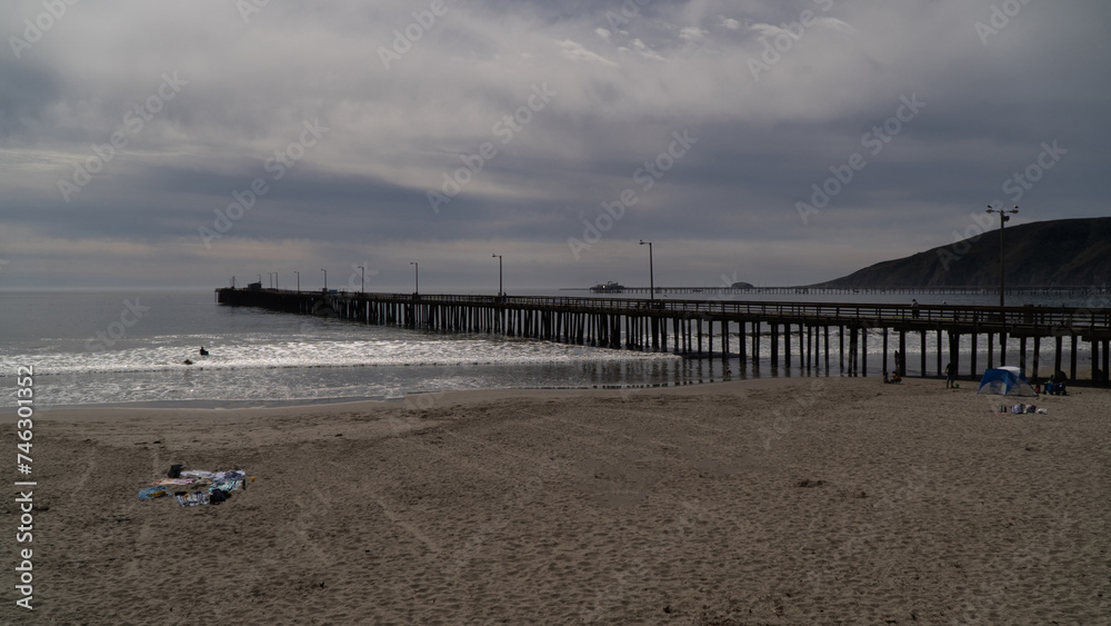 Long pier at Avila Beach California with cloudy sky