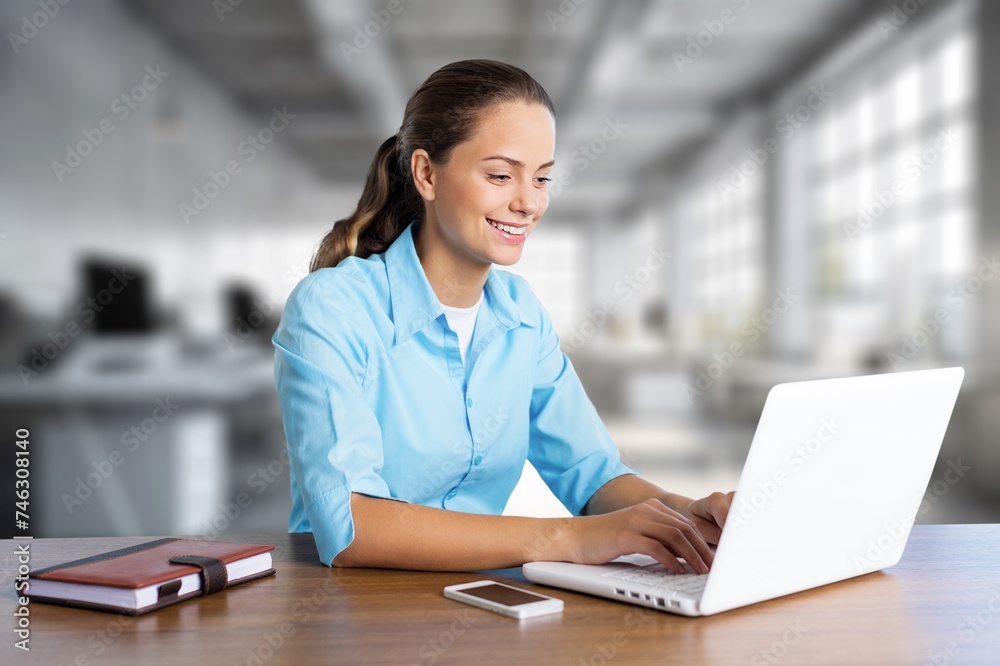 Portrait of cheerful business woman using gadgets Portrait of cheerful business woman using gadgets