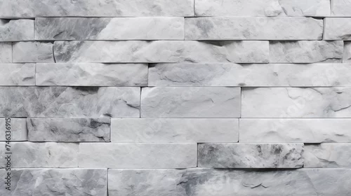 Obraz Abstrakcyjne ceglane szare tło - dekoracyjna murowana ściana z kamienia, tapeta trójwymiarowa. Surowe wykończenie wnętrza