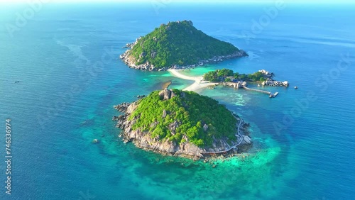 Koh Nangyuan charms with its stunning vistas, vibrant marine life, and picture-perfect scenery. Drone aerial view. Sea stock footage. Ko Tao, Surat Thani Province, Southern Thailand. 4K HDR. 
 photo