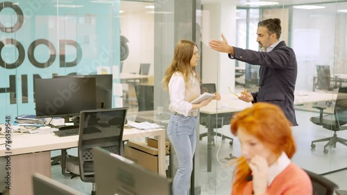 Boss yelling while partner prevents to fire an employee