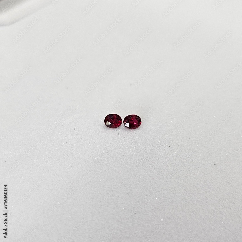 Loos gemstone as Opal and ruby on white paper. Design for making ring on jewelry factory store Loos gemstone as Opal and ruby on white paper. Design for making ring on jewelry factory store