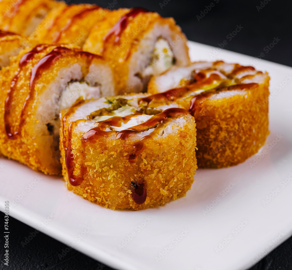 Warm tempura sushi rolls close up Warm tempura sushi rolls close up