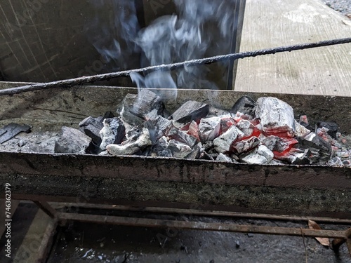 a tool usually used to grill satay using charcoal