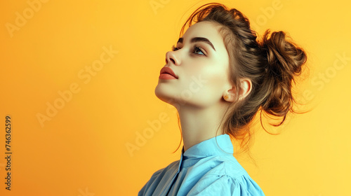 beautiful lovely girl fashionably dressed, orange background