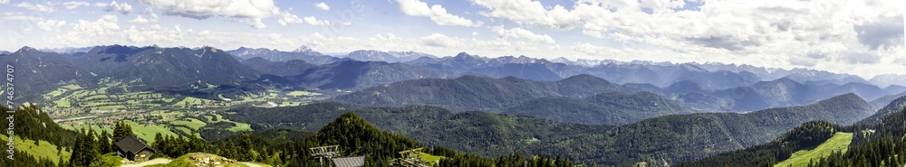 Fototapeta premium Clouds over grassy hillside