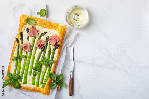 Asparagus puff pastry tart with prosciutto roses and mascarpone or cream cheese. Mother's Day breakfast recipe idea