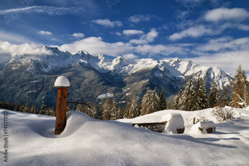 Beautiful snow-capped panorama of the mountains of the Aosta Valley, seen from the slopes above Morge.