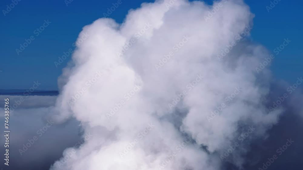 Cloud Of Smoke Billowing In The Sky From Industrial Factory. closeup shot Cloud Of Smoke Billowing In The Sky From Industrial Factory. closeup shot