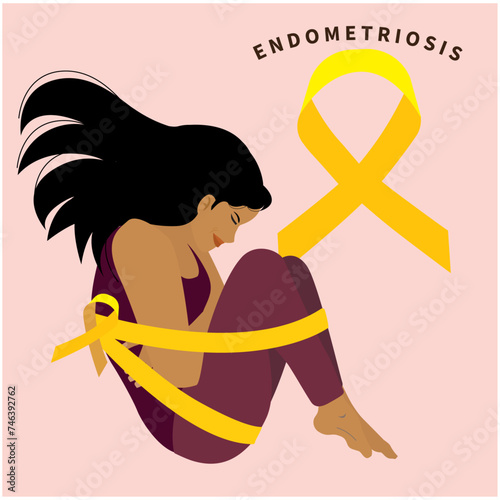 woman in pain from endometriosis next to yellow ribbon