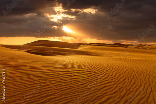 Sunset over the sand dunes in the desert. Rub  al Khali desert