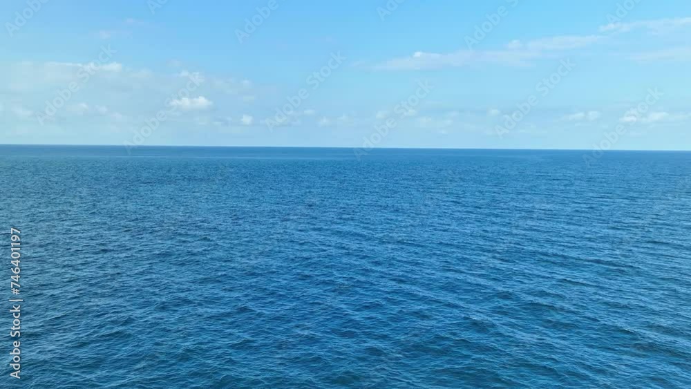 Explore the infinite beauty of the endless sea through the lens of a drone. Crystal-clear waters mingle with the azure sky, creating a breathtaking panorama. Stock footage. Tropical sea background.
Explore the infinite beauty of the endless sea through the lens of a drone. Crystal-clear waters mingle with the azure sky, creating a breathtaking panorama. Stock footage. Tropical sea background.