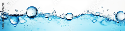 narrow panorama of bubbles in clear blue water background.