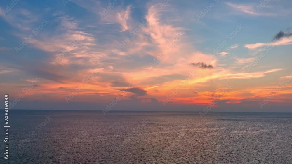 Capturing the boundless expanse of the sea under a golden sunset, a mesmerizing drone aerial view unfolds, endless horizons meeting tranquility. Flying from drone. Loop of sea background. 4K HDR.
Capturing the boundless expanse of the sea under a golden sunset, a mesmerizing drone aerial view unfolds, endless horizons meeting tranquility. Flying from drone. Loop of sea background. 4K HDR.