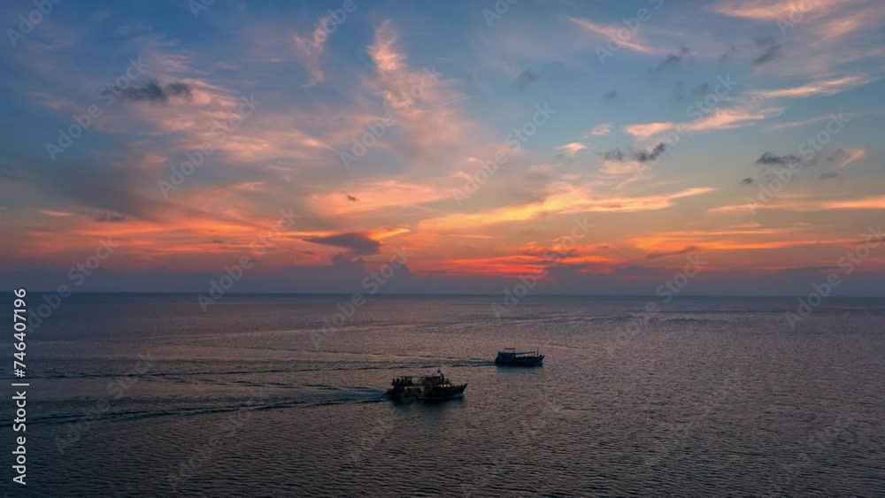 Surrender to the boundless beauty of the sea meeting the sky in a captivating drone aerial shot, capturing the tranquil sunset horizon. Nature stock footage. Bird's eye view. Sea background. 4K.
Surrender to the boundless beauty of the sea meeting the sky in a captivating drone aerial shot, capturing the tranquil sunset horizon. Nature stock footage. Bird's eye view. Sea background. 4K.