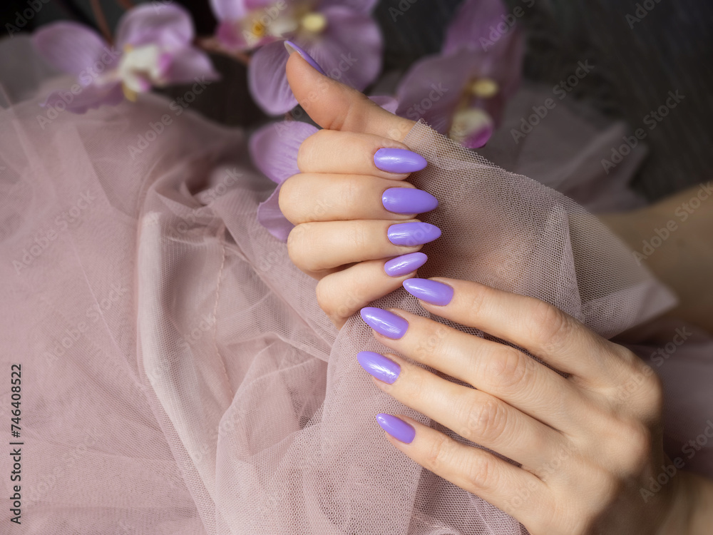Beauty elegant female hands with french manicure Beauty elegant female hands with french manicure