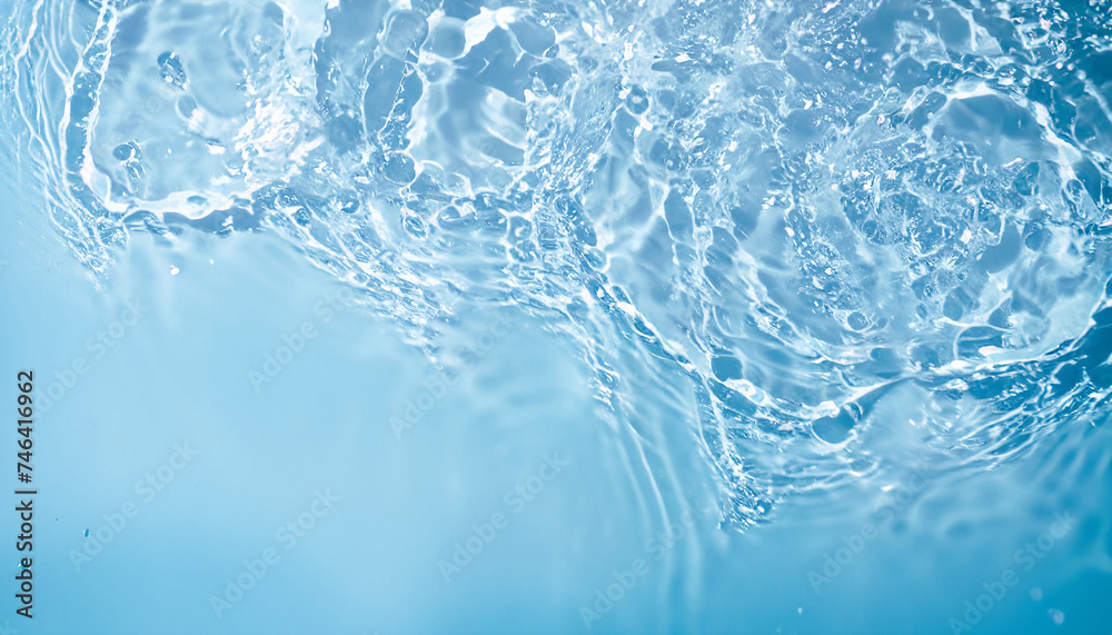 texture of splashing clean water on pastel background; beautiful blue and white backdrop